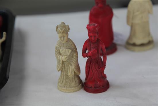 A 19th century Macau carved and stained ivory chess set, king 4.75in.